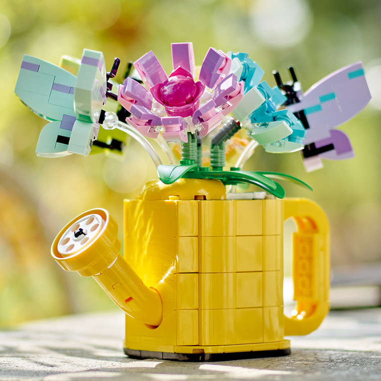 Flowers In Watering Can 