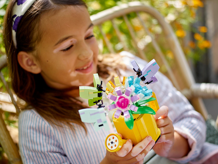 Flowers In Watering Can 